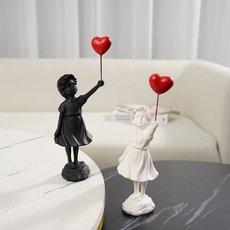 Girl with Balloon Sculpture
