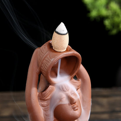 Close-Up of Creative Ceramic Incense Burner Woman