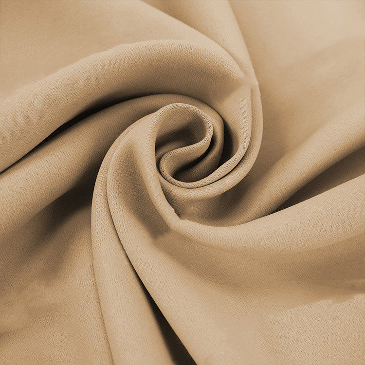 close up of beige black out curtains. cloth curtains. black out curtains.